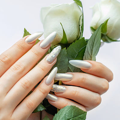 Trendy nail art on well-manicured hand