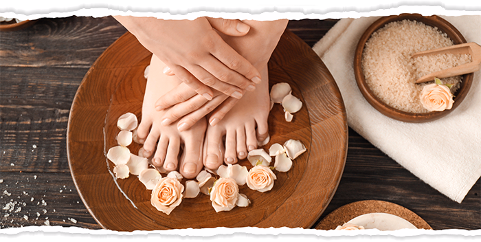 Newly finished manicure and pedicure on clean, beautiful nails